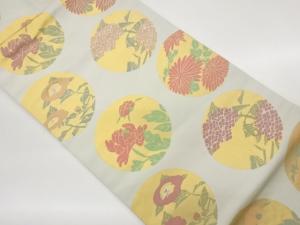 丸に草花模様織出し名古屋帯
